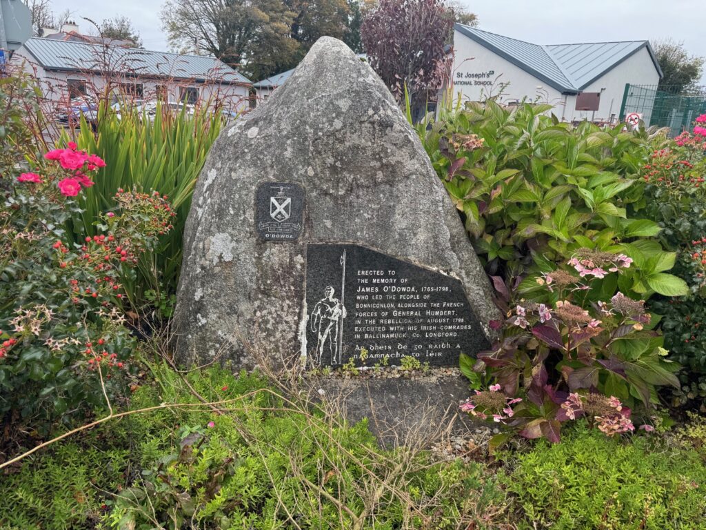 James O'Dowda Monument, Bonniconlon — limestone boulder with bronze plaque commemorating Colonel Baron James Vippler O'Dowda (1765–1798), executed at Ballinamuck.