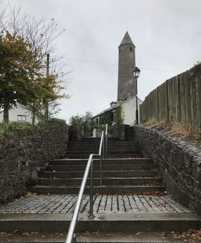 Killala Round Tower, Co. Mayo — the 12th-century cloigtheach standing over the roofs of the town