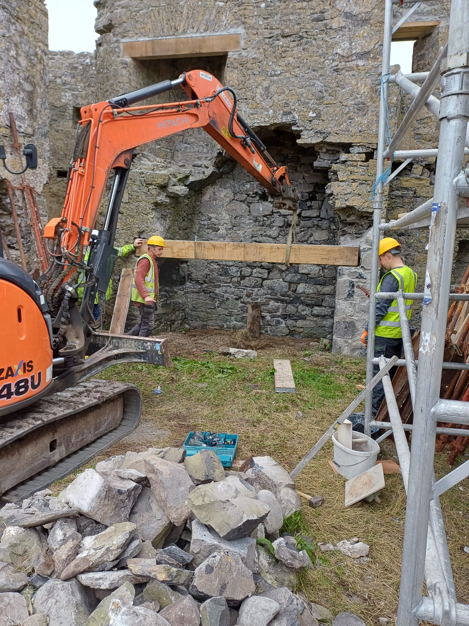 Excavator working on castle masonry, 10 October 2025